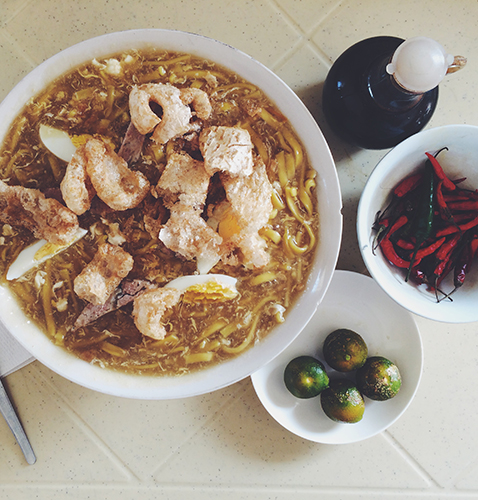 la paz batchoy with calamansi chili and soy sauce